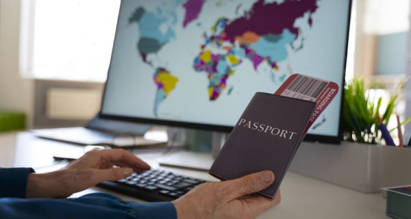 side-view-man-holding-passports (1)